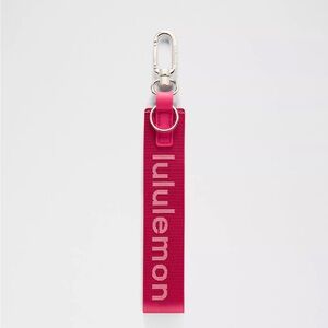 Lululemon Never Lost Keychain- Raspberry Coulis/Bright Coral New with tags